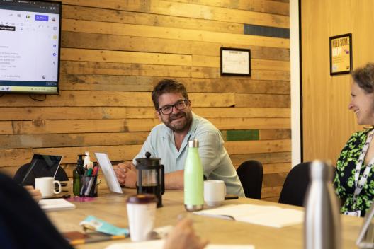 Matthew Horne in a meeting