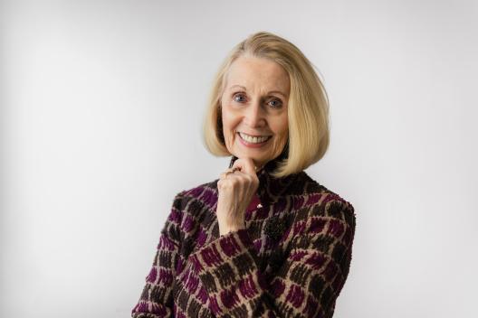 Valerie Hannon smiles at the camera