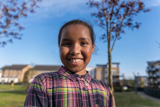 Young Black girl in a park  