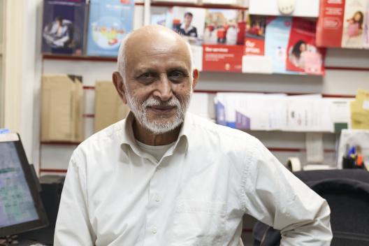 Older worker at a post office