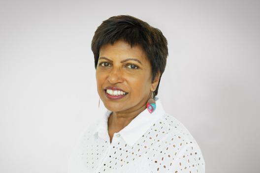 Radhika Bynon smiling at the camera