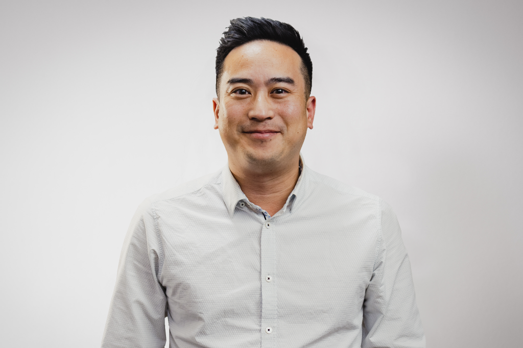 Ken Yeung smiles at the camera