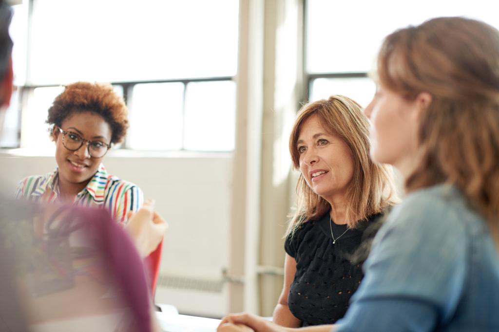 Three women in conversation