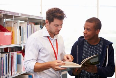 Young person and librarian learning together