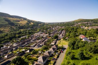 Aerial overhead view of houses in the Welsh Valley of Blaenau Gwent