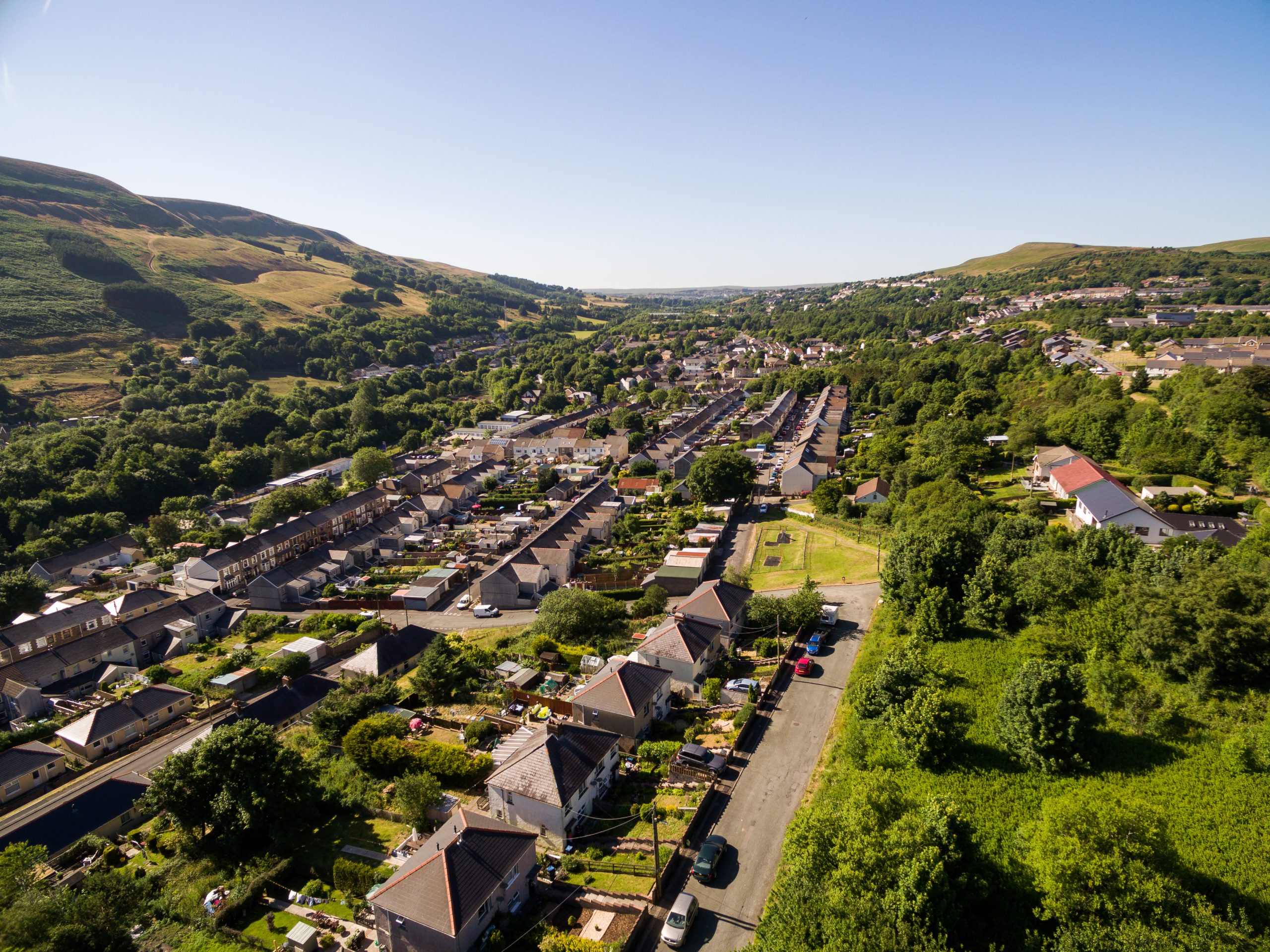 Aerial overhead view of houses in the Welsh Valley of Blaenau Gwent