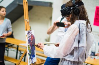 Student using VR to produce artwork